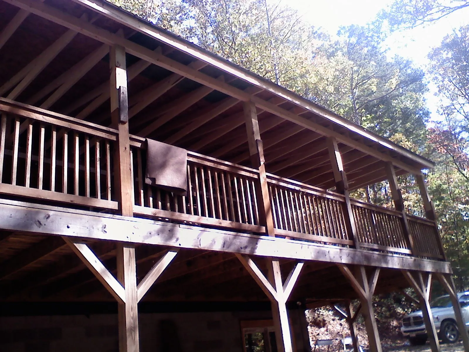 Timber framing under a new elevated porch and deck — Roof Leak Repair in Hackleburg by Roofing Brothers